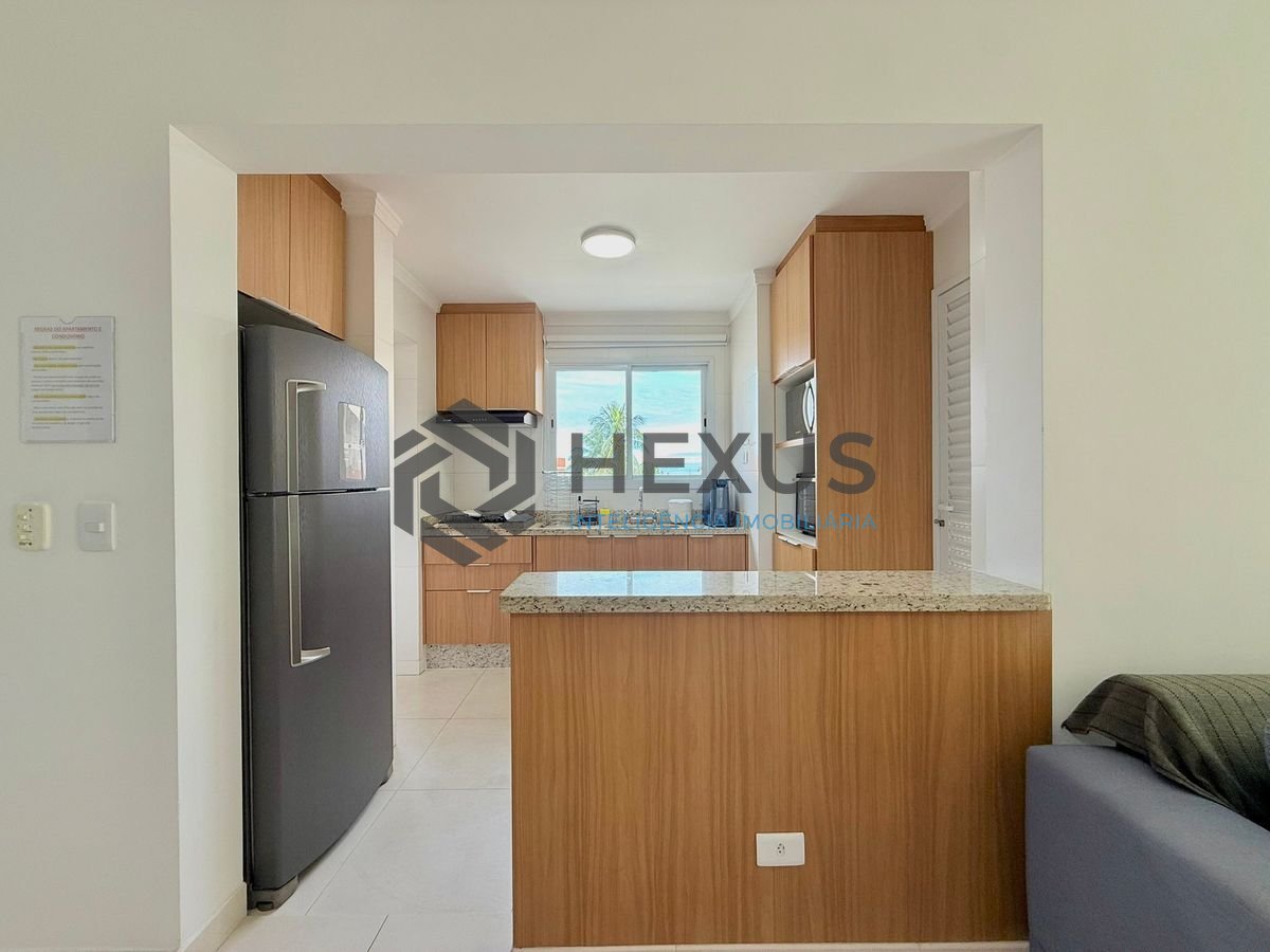 Foto 16 de Apartamento reformado com varanda e lazer a 250m da praia na região da Brunela na Enseada, Guarujá