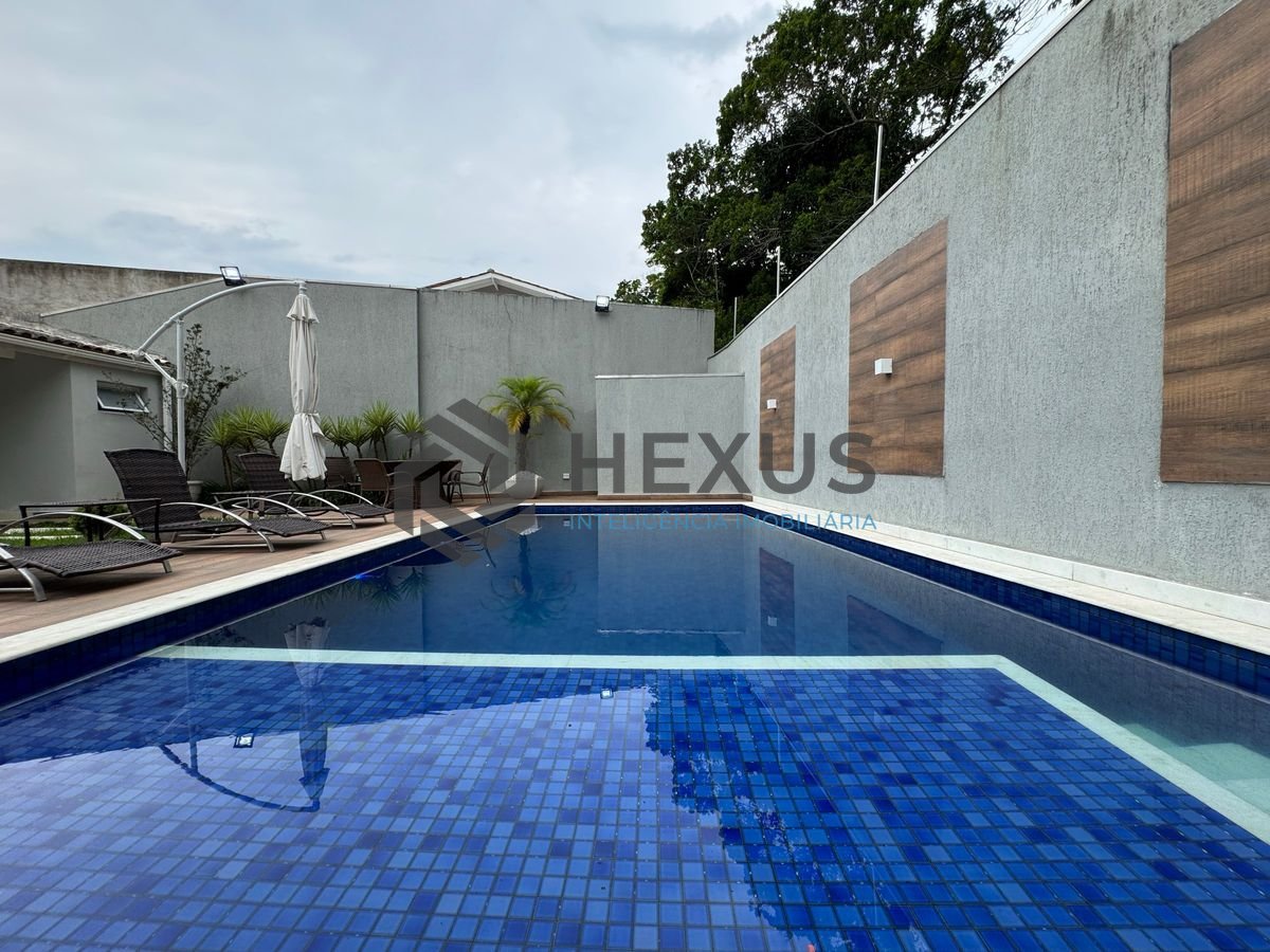 Foto 25 de Casa reformada com piscina e área gourmet no Jardim Pernambuco I, Guarujá