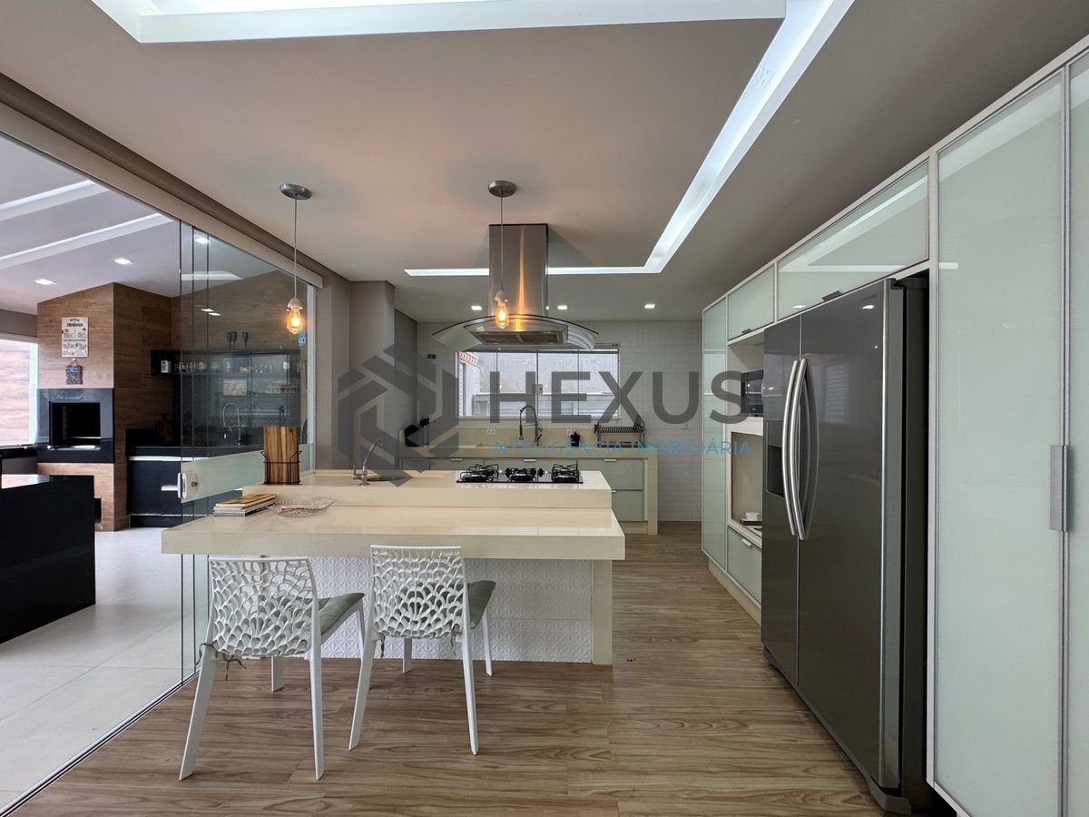 Foto 18 de Casa reformada com piscina e área gourmet no Jardim Pernambuco I, Guarujá