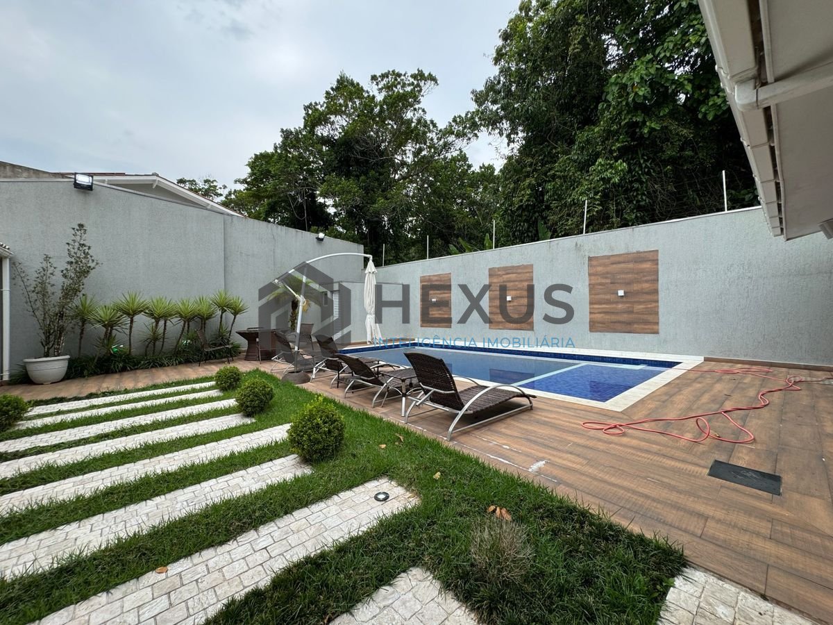 Foto 24 de Casa reformada com piscina e área gourmet no Jardim Pernambuco I, Guarujá