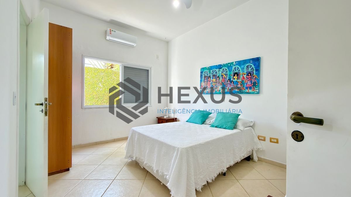 Foto 10 de Casa reformada com piscina e área gourmet no Jardim Acapulco, Guarujá