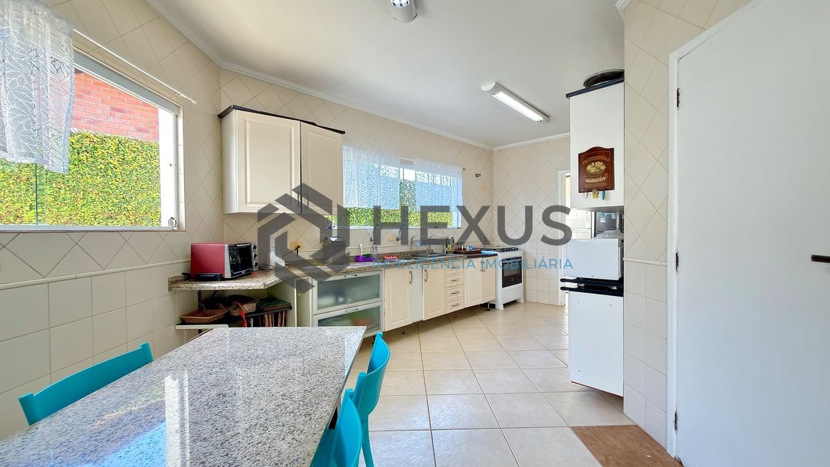 Foto 8 de Casa reformada com piscina e área gourmet no Jardim Acapulco, Guarujá