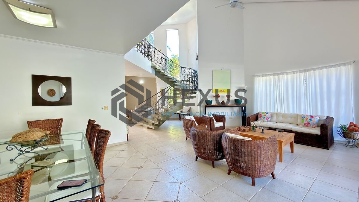 Foto 6 de Casa reformada com piscina e área gourmet no Jardim Acapulco, Guarujá