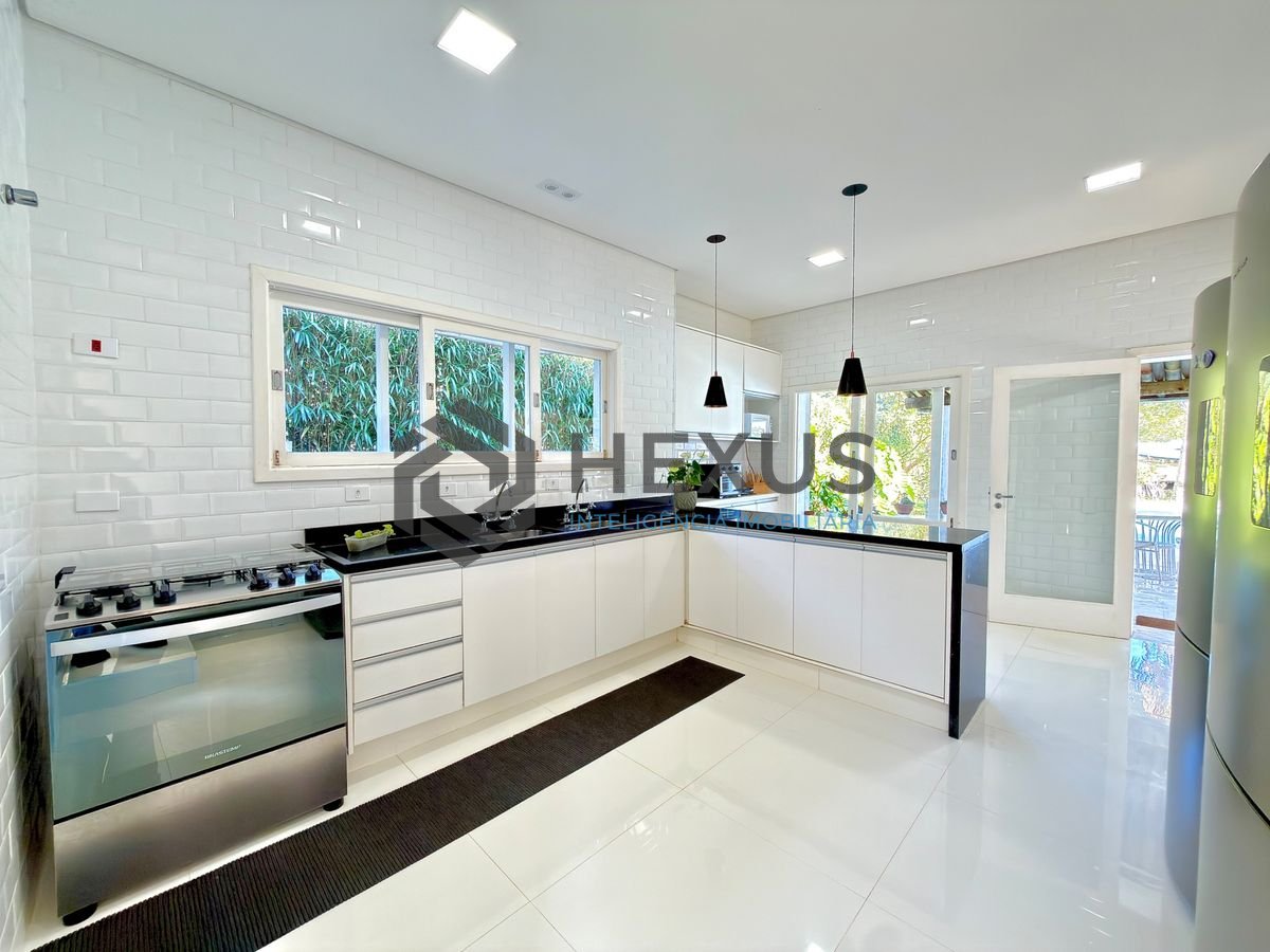 Foto 11 de Casa com pier  e área gourmet no Residencial Marinas Guarujá