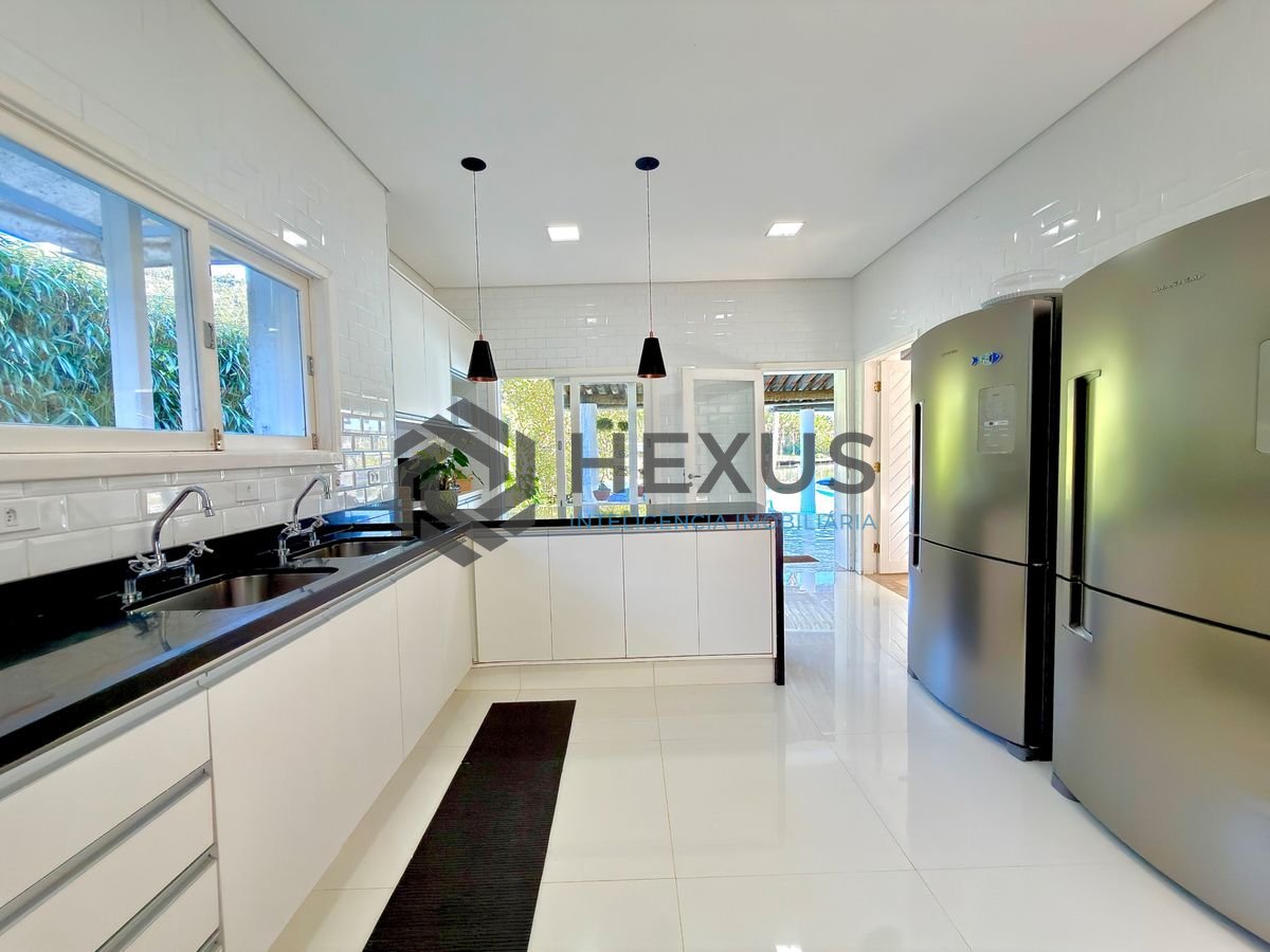 Foto 5 de Casa com pier  e área gourmet no Residencial Marinas Guarujá