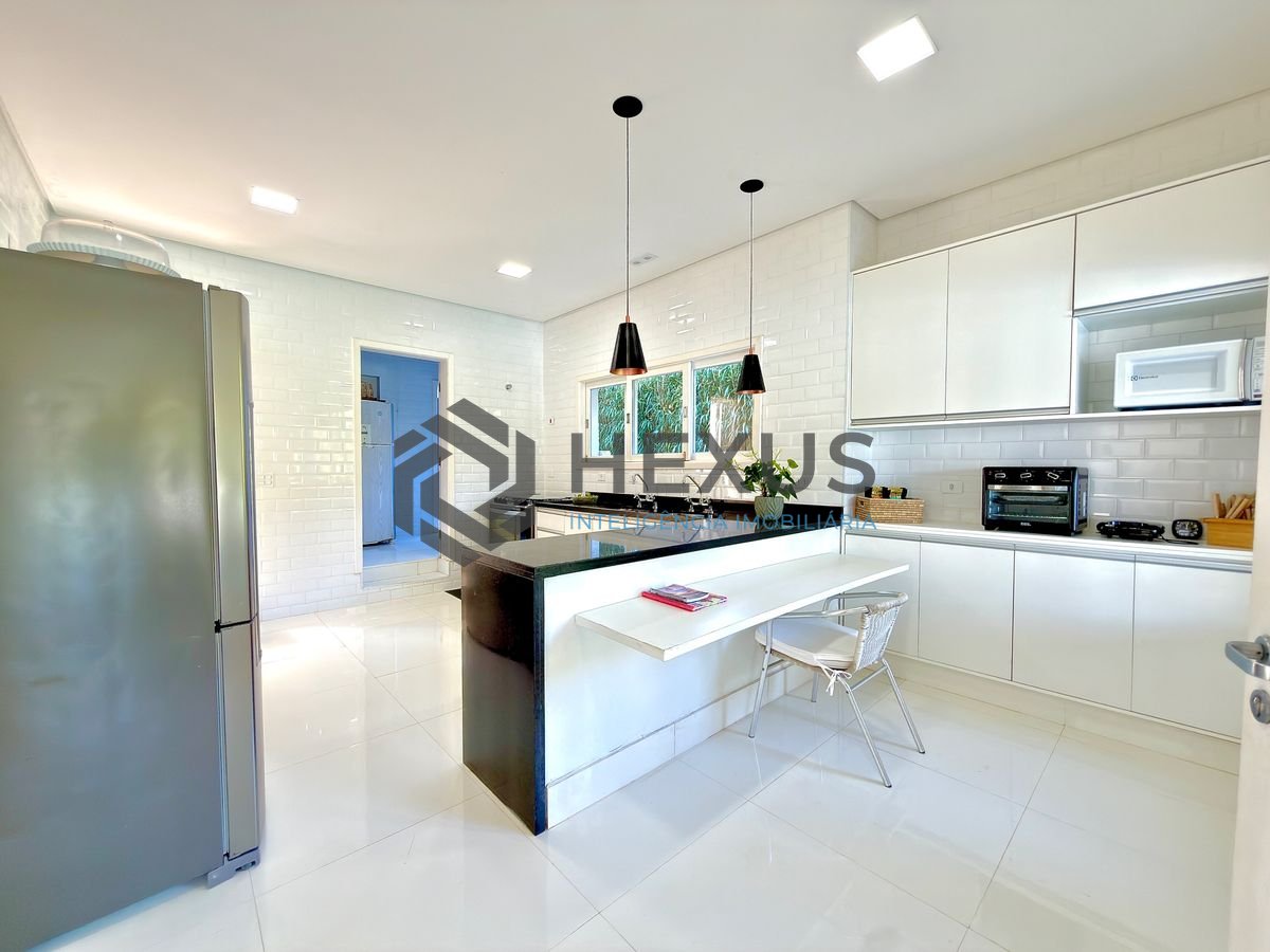 Foto 6 de Casa com pier  e área gourmet no Residencial Marinas Guarujá