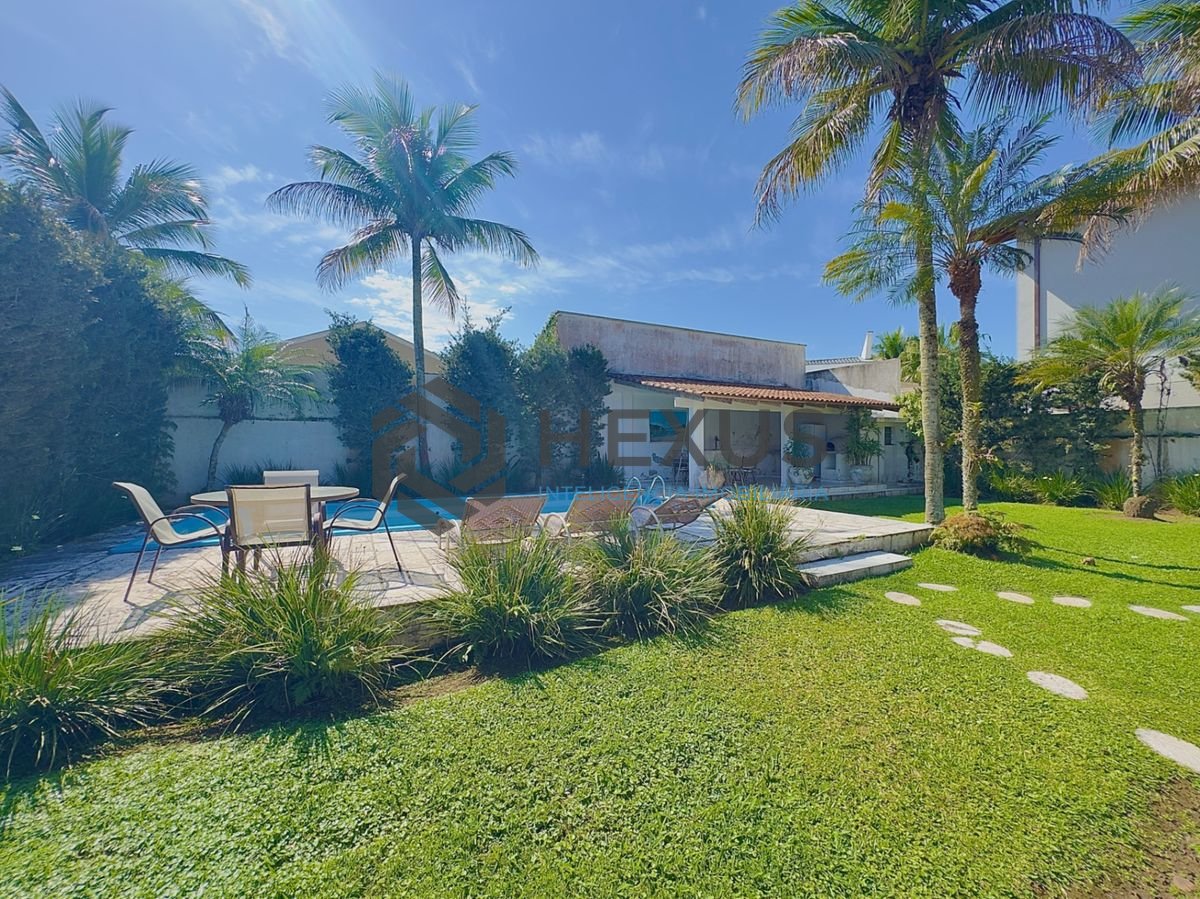 Foto 7 de Casa com piscina e área gourmet no Jardim Acapulco, Guarujá