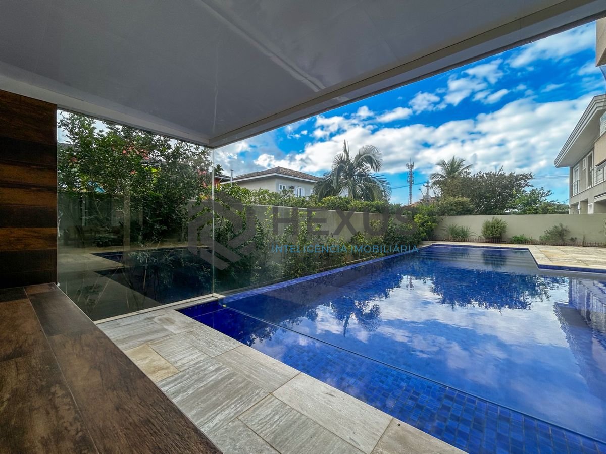 Foto 16 de Casa reformada com piscina e área gourmet no Granville na Enseada, Guarujá