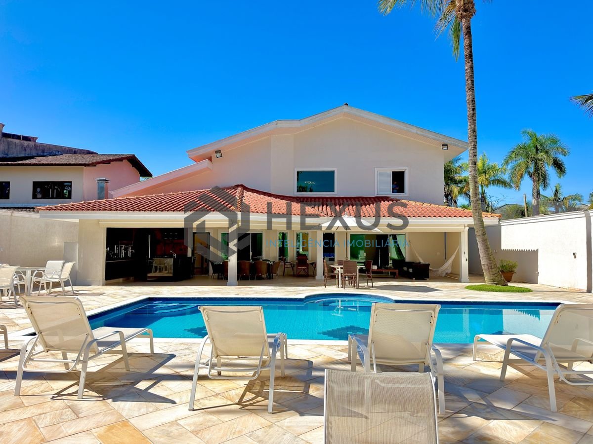 Foto 5 de Casa de alto padrão com varanda piscina e área gourmet no Jardim Acapulco, Guarujá