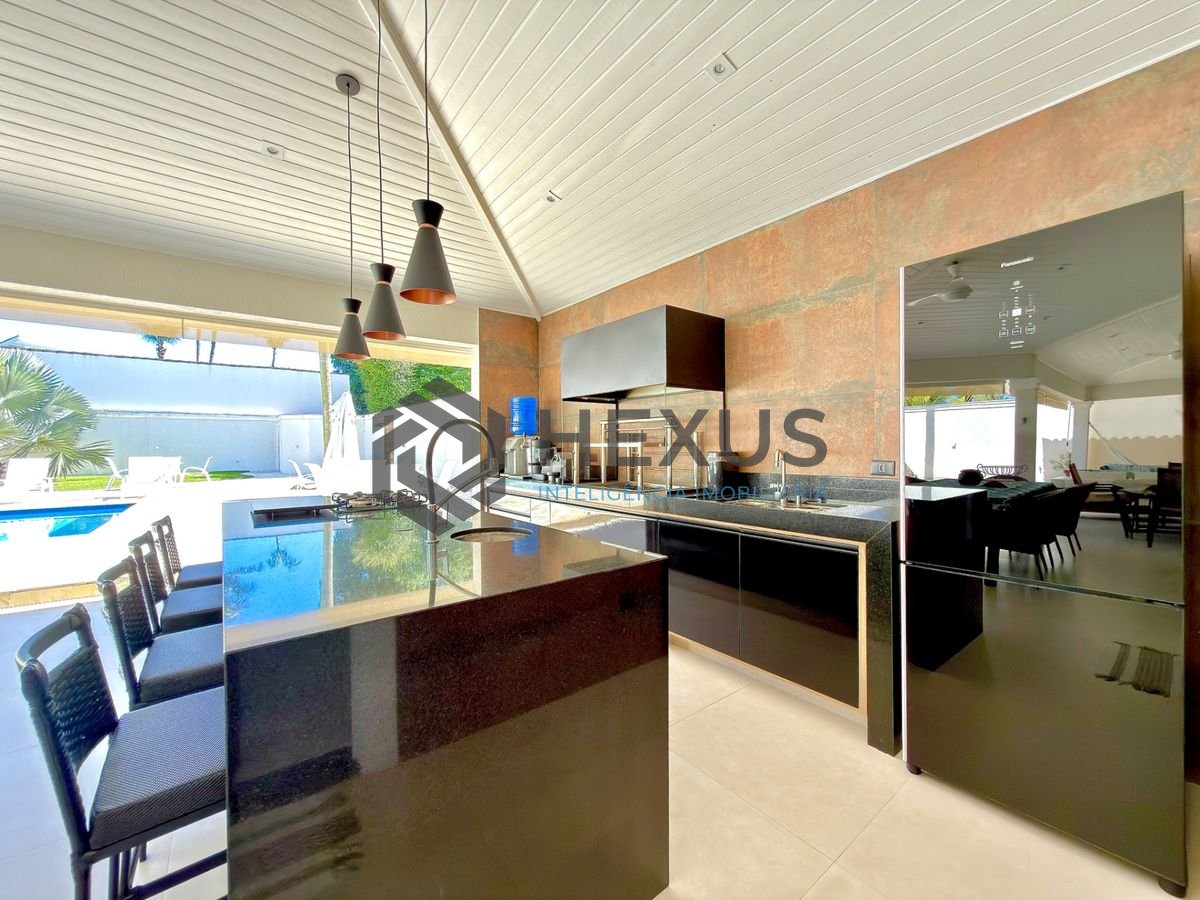Foto 8 de Casa de alto padrão com varanda piscina e área gourmet no Jardim Acapulco, Guarujá