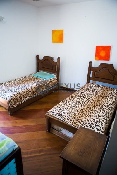 Foto 16 de Casa reformada com piscina e área gourmet no Jardim Acapulco, Guarujá