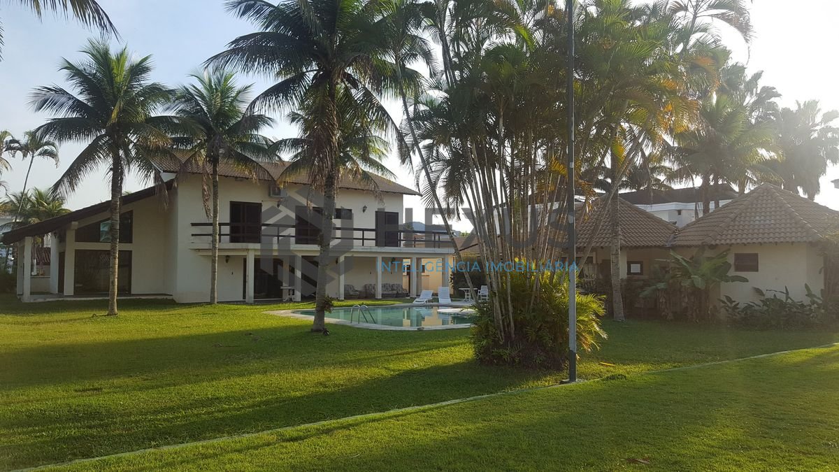 Foto 11 de Casa reformada com piscina e área gourmet no Jardim Acapulco, Guarujá
