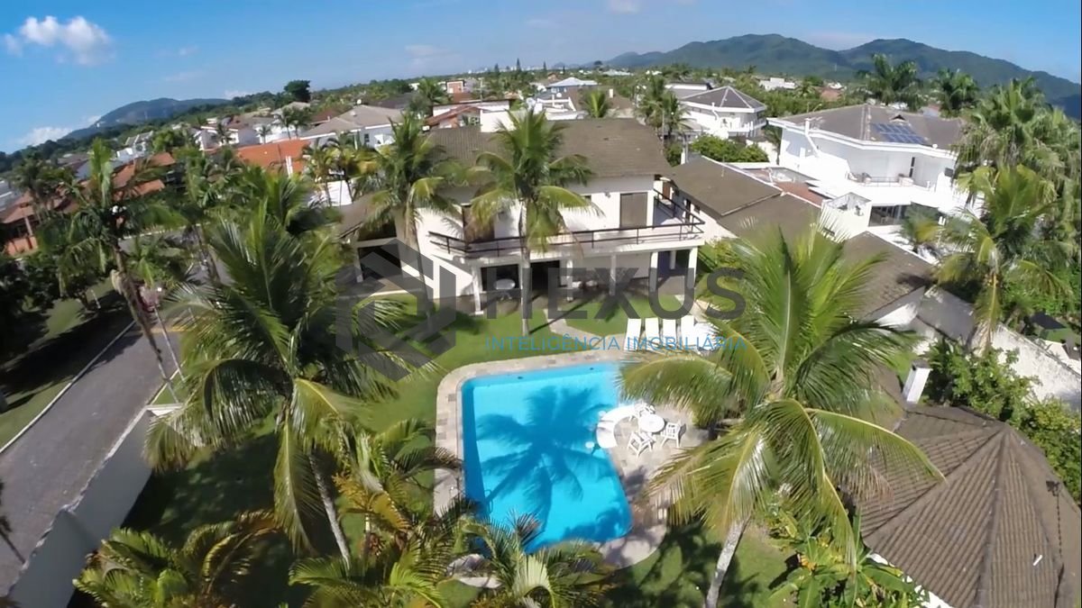 Foto 14 de Casa reformada com piscina e área gourmet no Jardim Acapulco, Guarujá