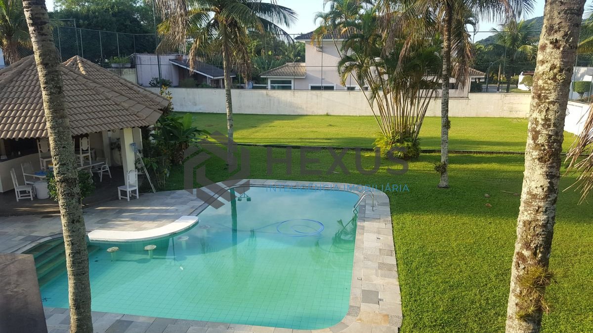 Foto 12 de Casa reformada com piscina e área gourmet no Jardim Acapulco, Guarujá