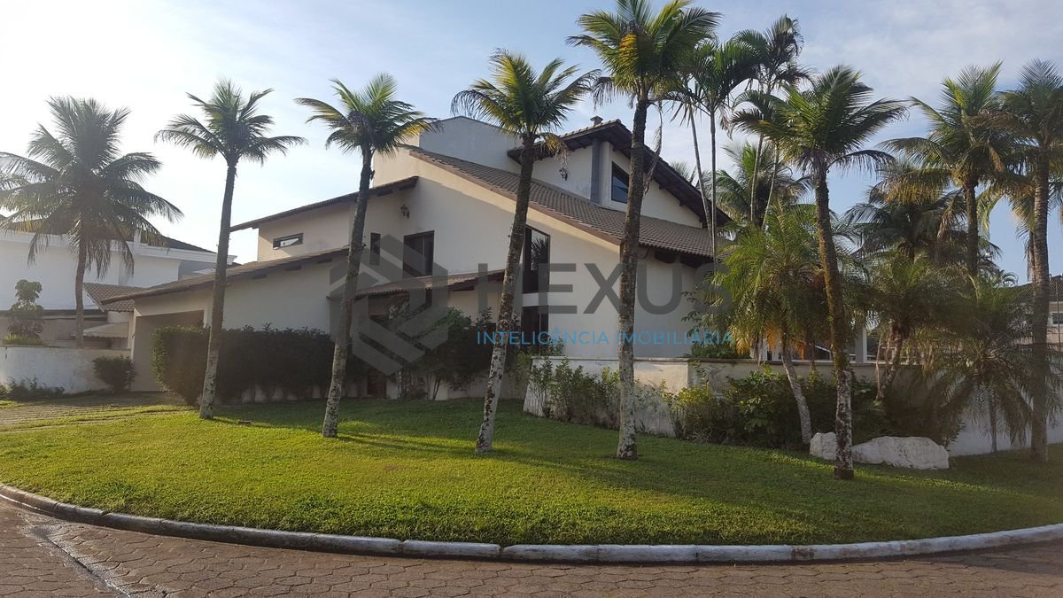 Foto 9 de Casa reformada com piscina e área gourmet no Jardim Acapulco, Guarujá