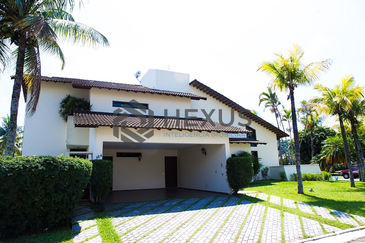 Foto 3 de Casa reformada com piscina e área gourmet no Jardim Acapulco, Guarujá
