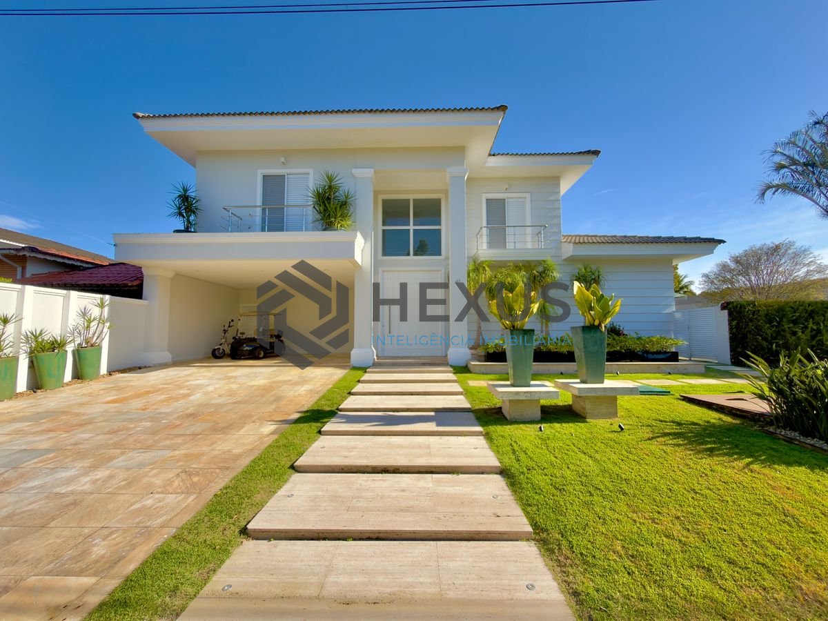 Foto 2 de Casa reformada com piscina e área gourmet no Jardim Acapulco, Guarujá