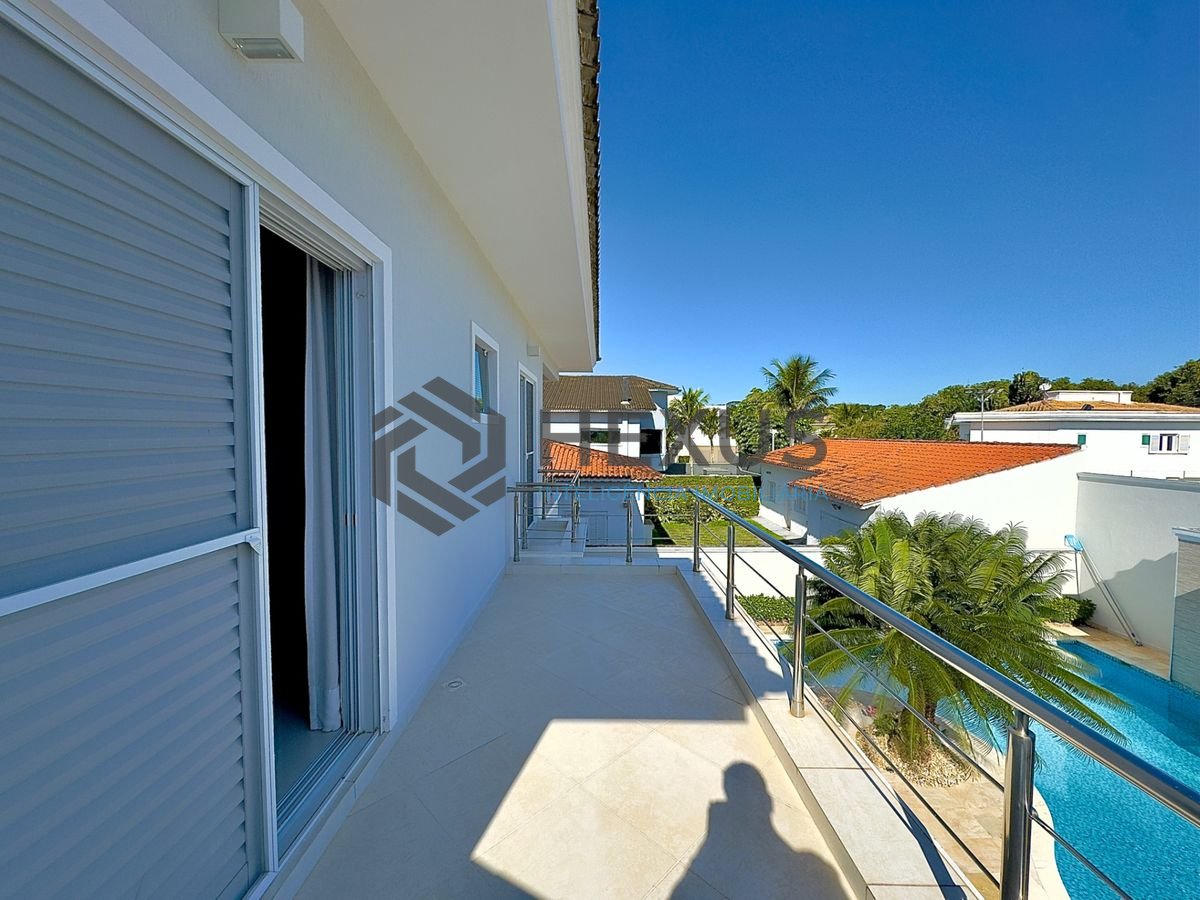 Foto 27 de Casa reformada com piscina e área gourmet no Jardim Acapulco, Guarujá