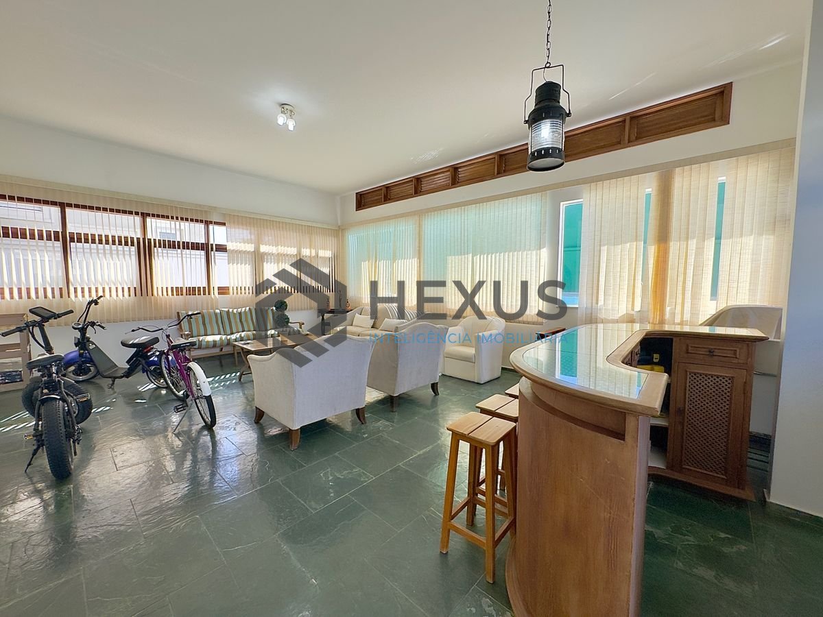 Foto 7 de Casa reformada com piscina e área gourmet no Jardim Acapulco, Guarujá