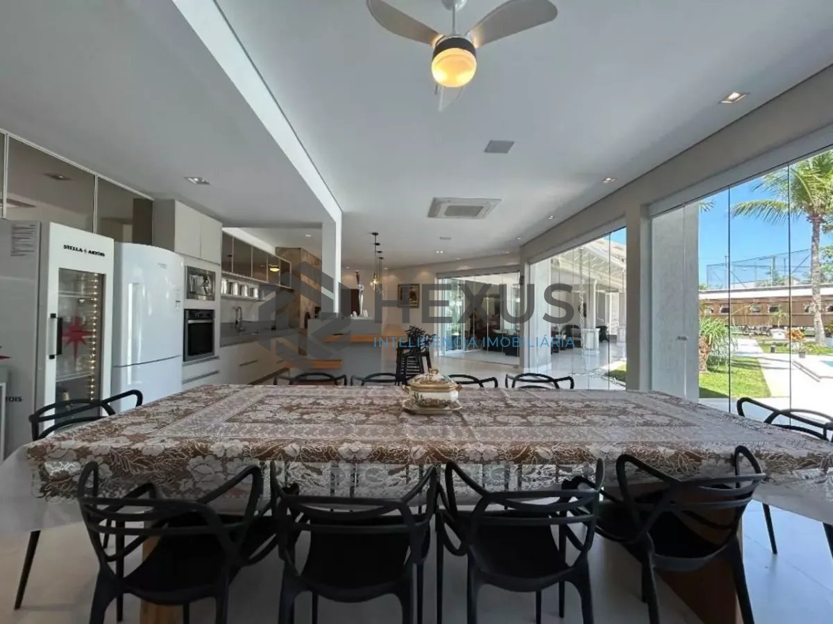 Foto 6 de Casa reformada com piscina e área gourmet no Jardim Acapulco, Guarujá