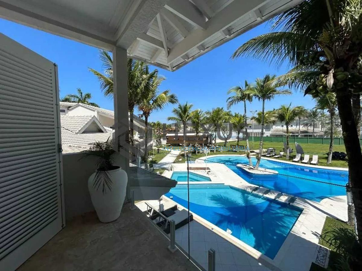 Foto 40 de Casa reformada com piscina e área gourmet no Jardim Acapulco, Guarujá