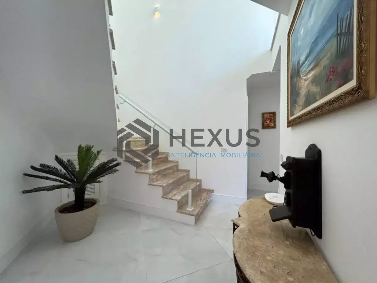 Foto 8 de Casa reformada com piscina e área gourmet no Jardim Acapulco, Guarujá