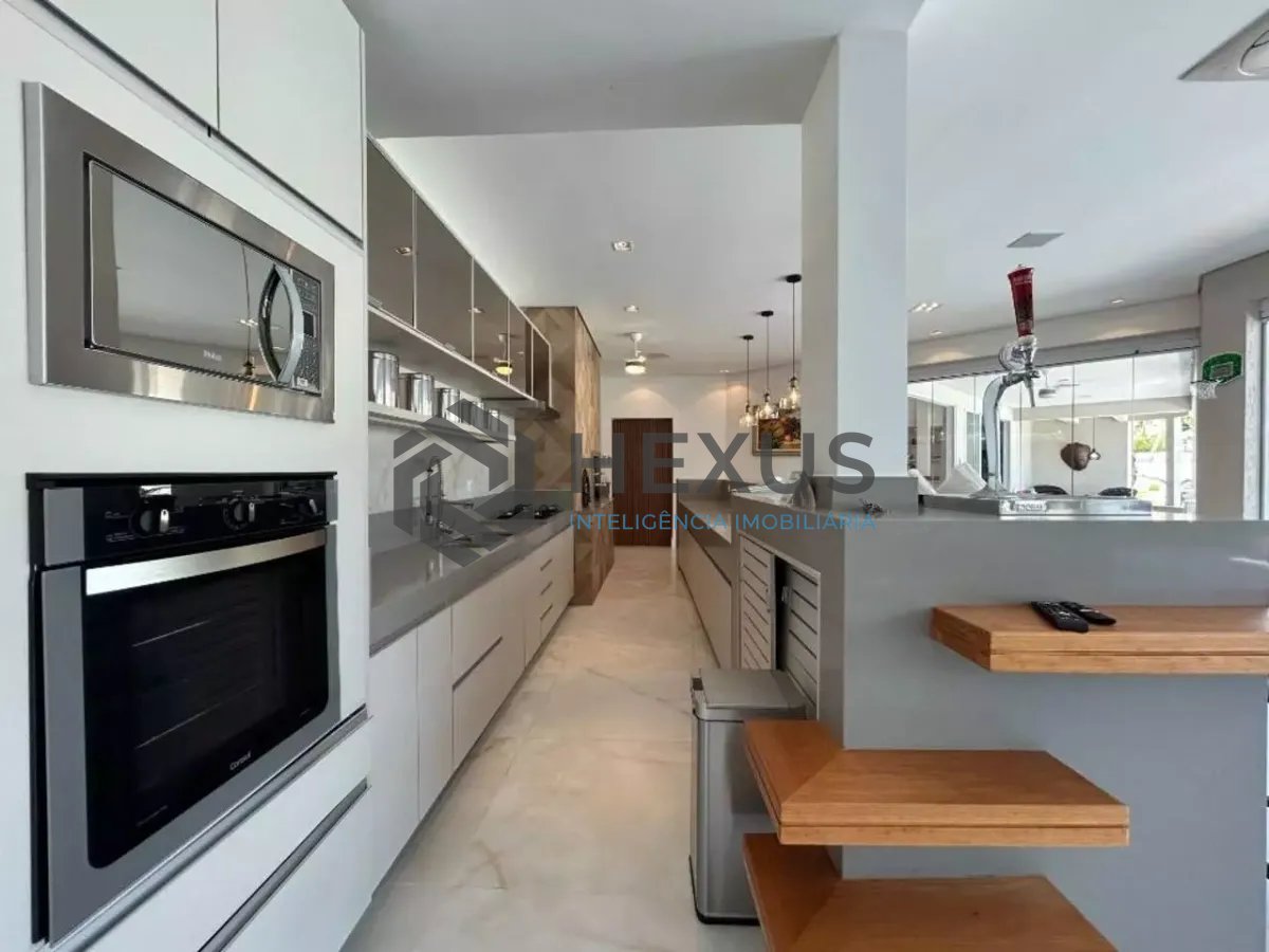 Foto 37 de Casa reformada com piscina e área gourmet no Jardim Acapulco, Guarujá