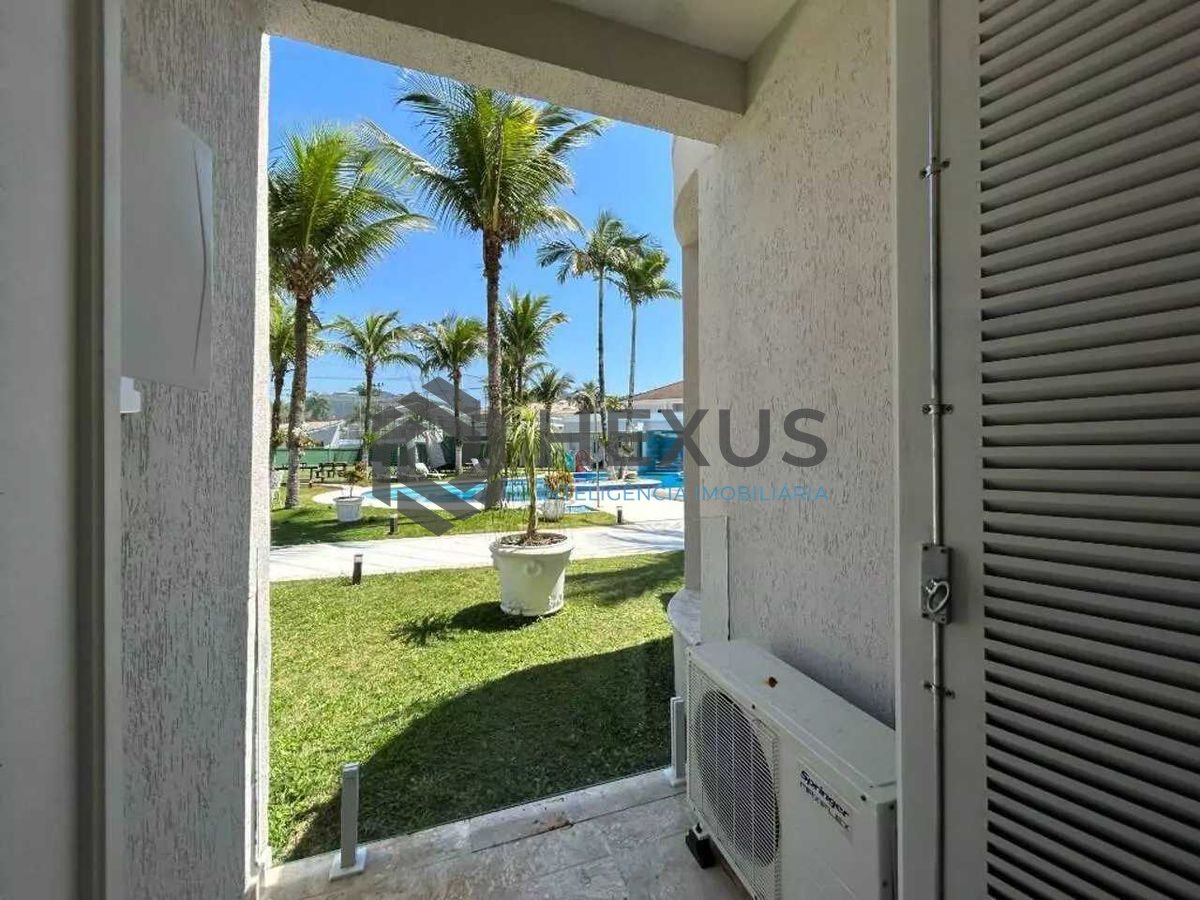 Foto 14 de Casa reformada com piscina e área gourmet no Jardim Acapulco, Guarujá