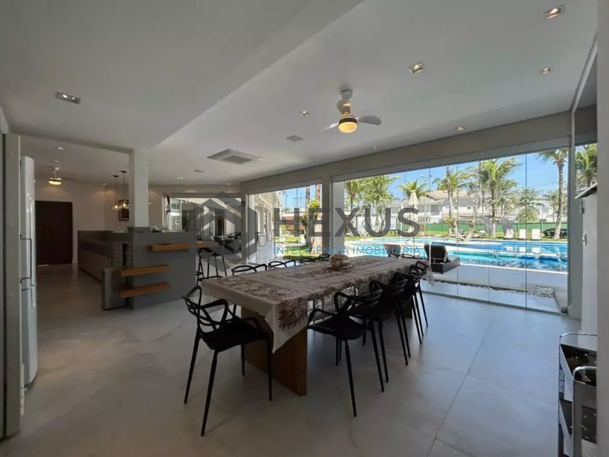 Foto 5 de Casa reformada com piscina e área gourmet no Jardim Acapulco, Guarujá
