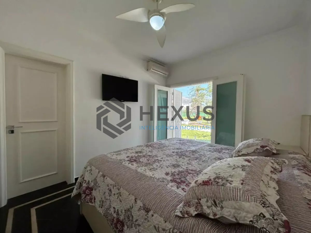 Foto 12 de Casa reformada com piscina e área gourmet no Jardim Acapulco, Guarujá