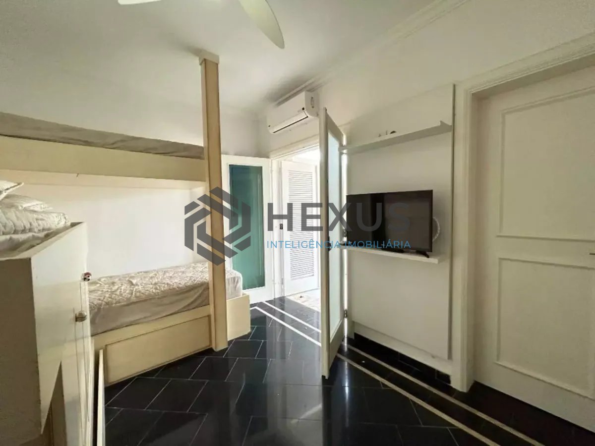 Foto 10 de Casa reformada com piscina e área gourmet no Jardim Acapulco, Guarujá