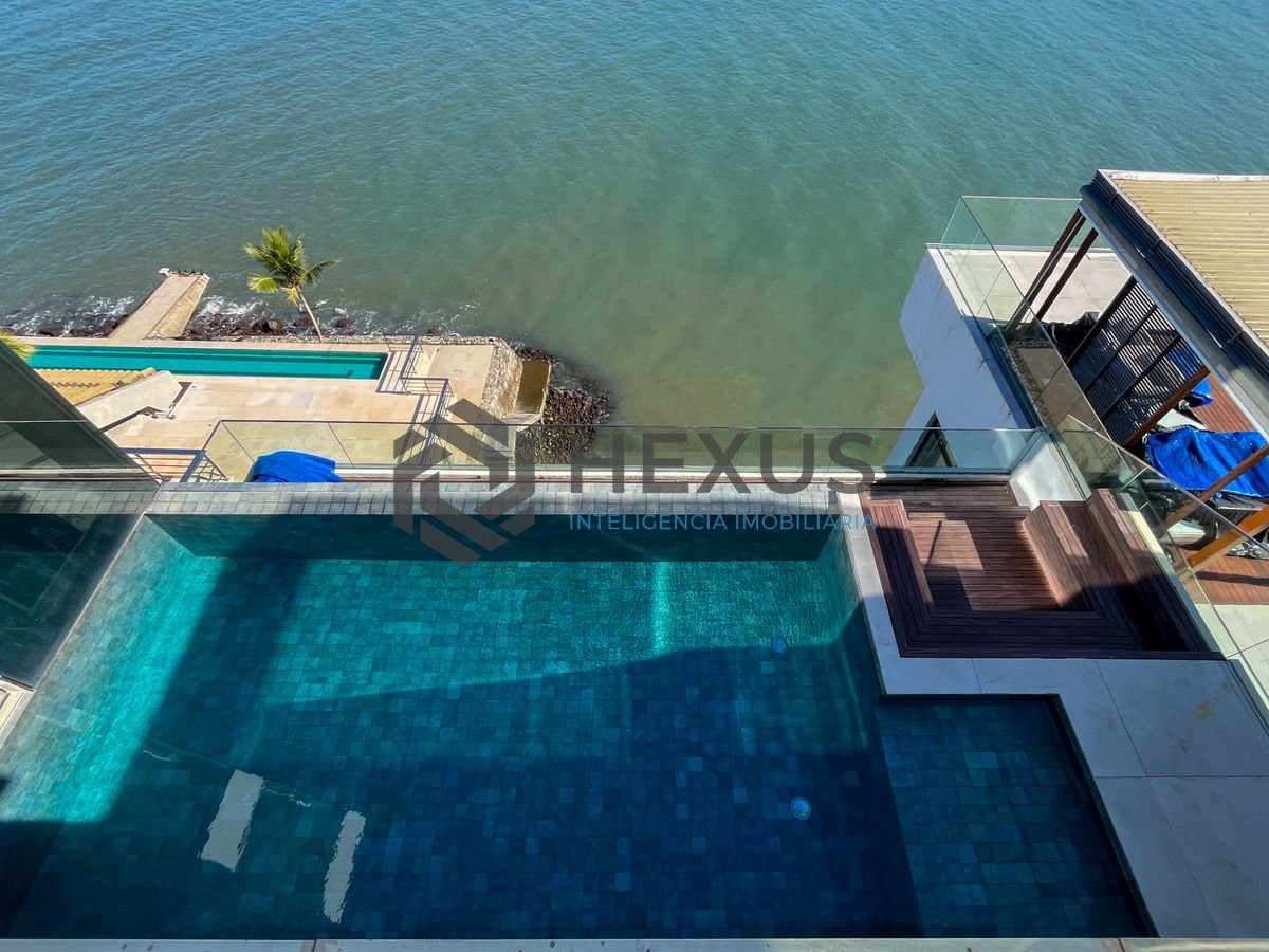 Foto 33 de Casa frente mar com piscina e garagem náutica na Peninsula, Guarujá, SP