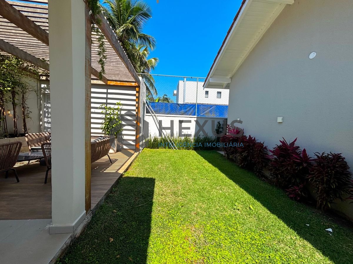 Foto 11 de Casa reformada com piscina e área gourmet no Jardim Acapulco, Guarujá