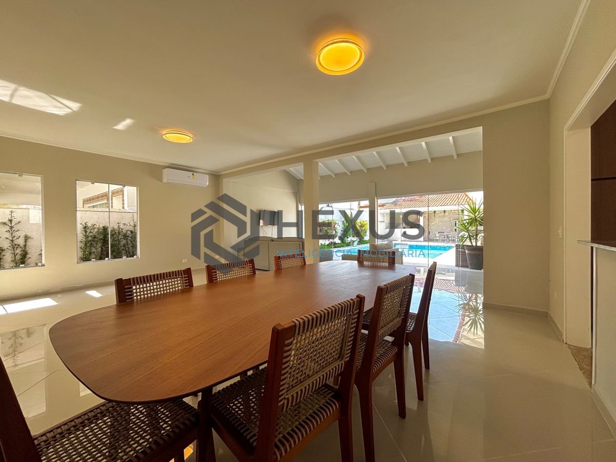 Foto 7 de Casa reformada com piscina e área gourmet no Jardim Acapulco, Guarujá
