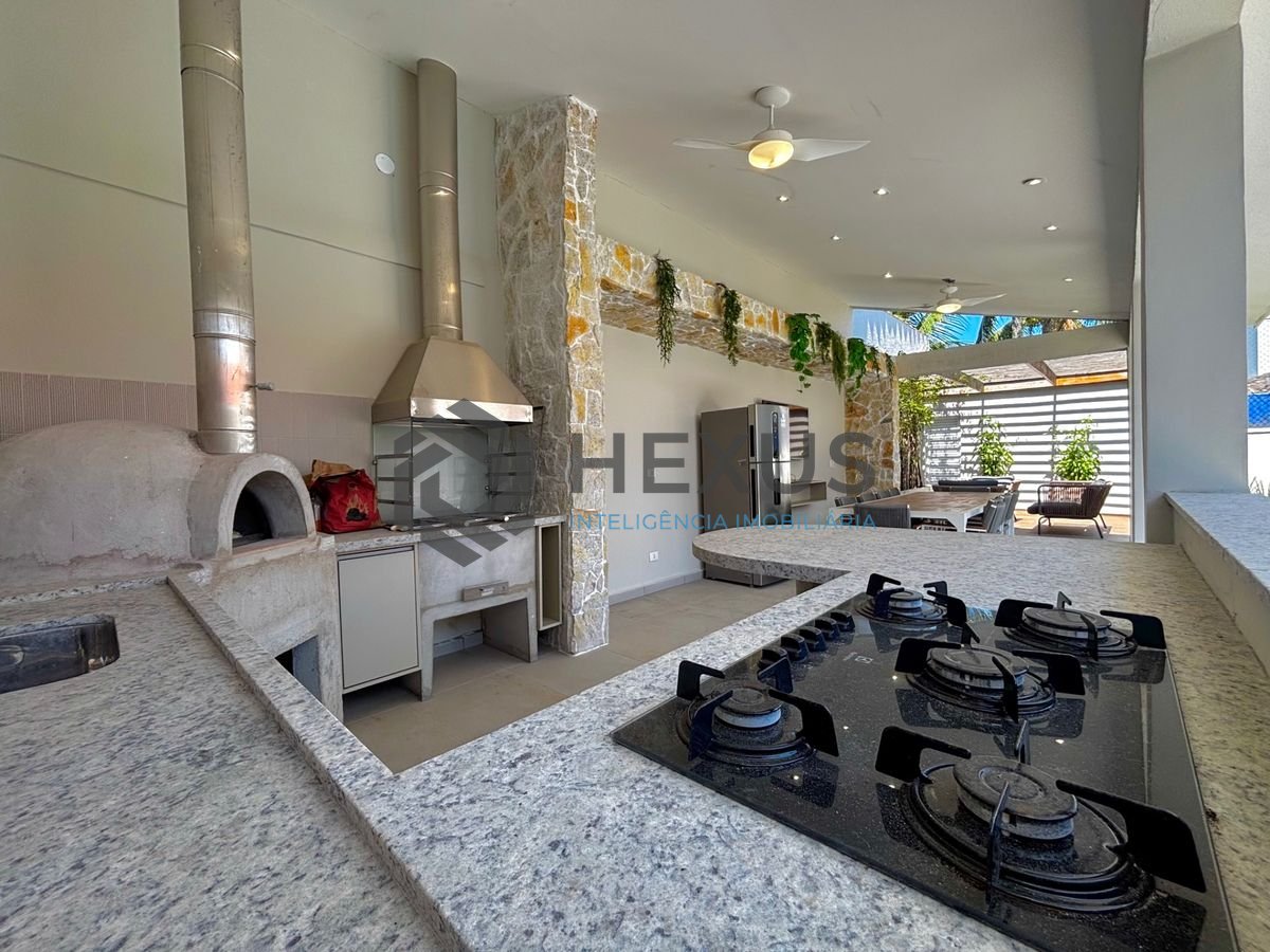 Foto 5 de Casa reformada com piscina e área gourmet no Jardim Acapulco, Guarujá