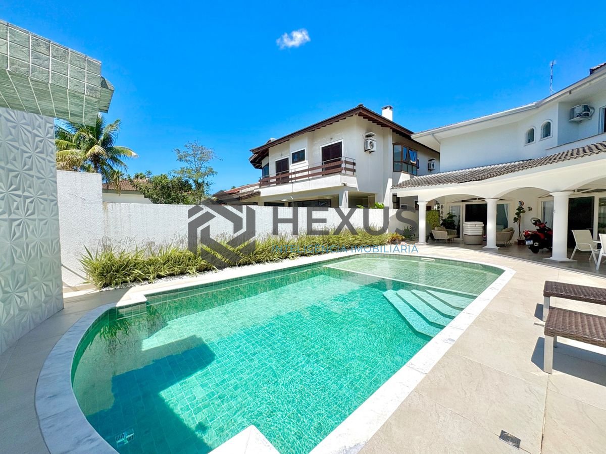 Foto 11 de Casa reformada com piscina e área gourmet no Jardim Acapulco, Guarujá