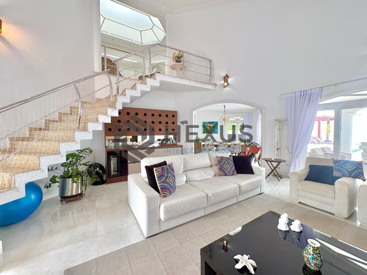 Foto 7 de Casa reformada com piscina e área gourmet no Jardim Acapulco, Guarujá