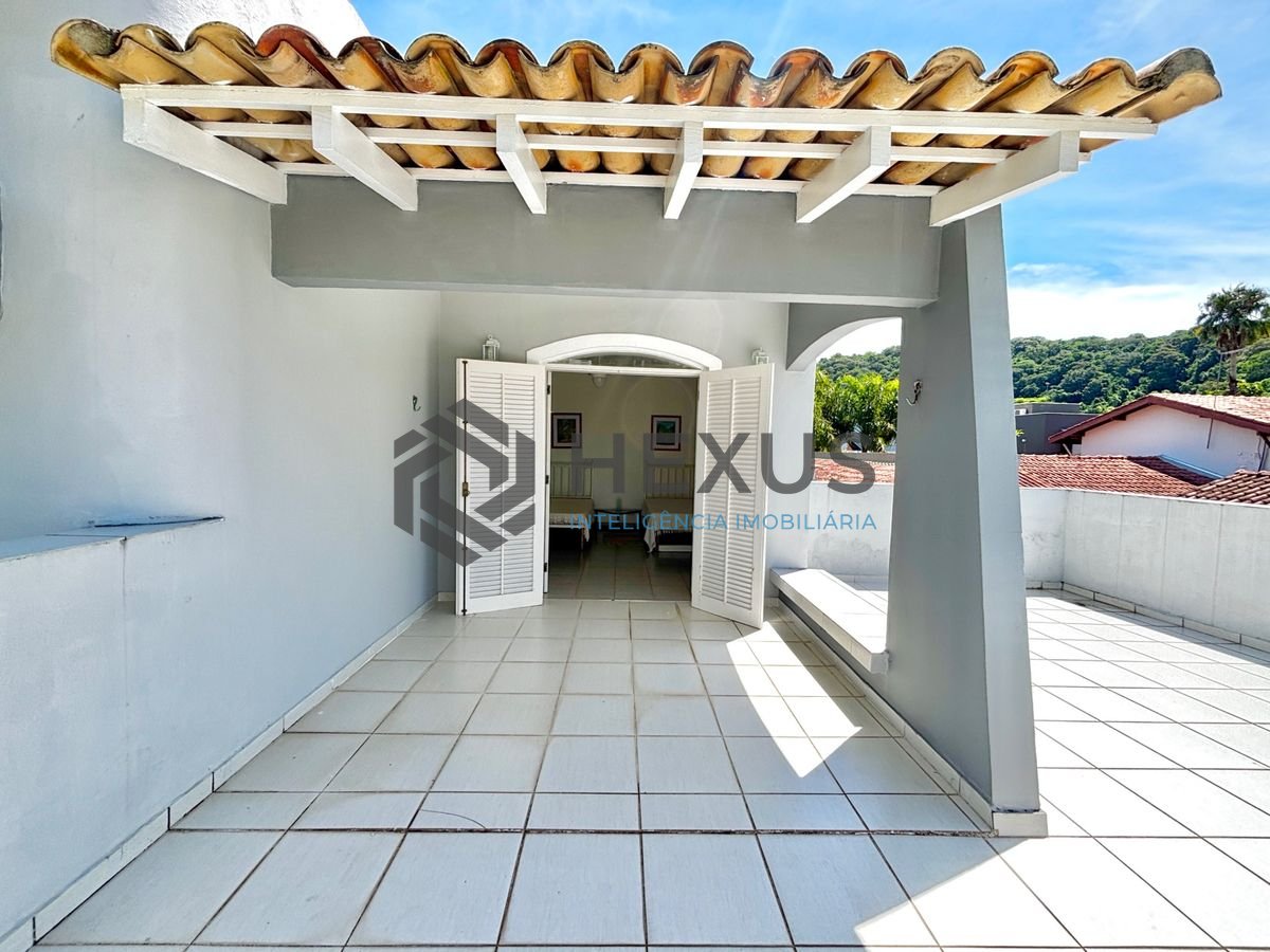 Foto 11 de Casa reformada com piscina e área gourmet no Jardim Acapulco, Guarujá
