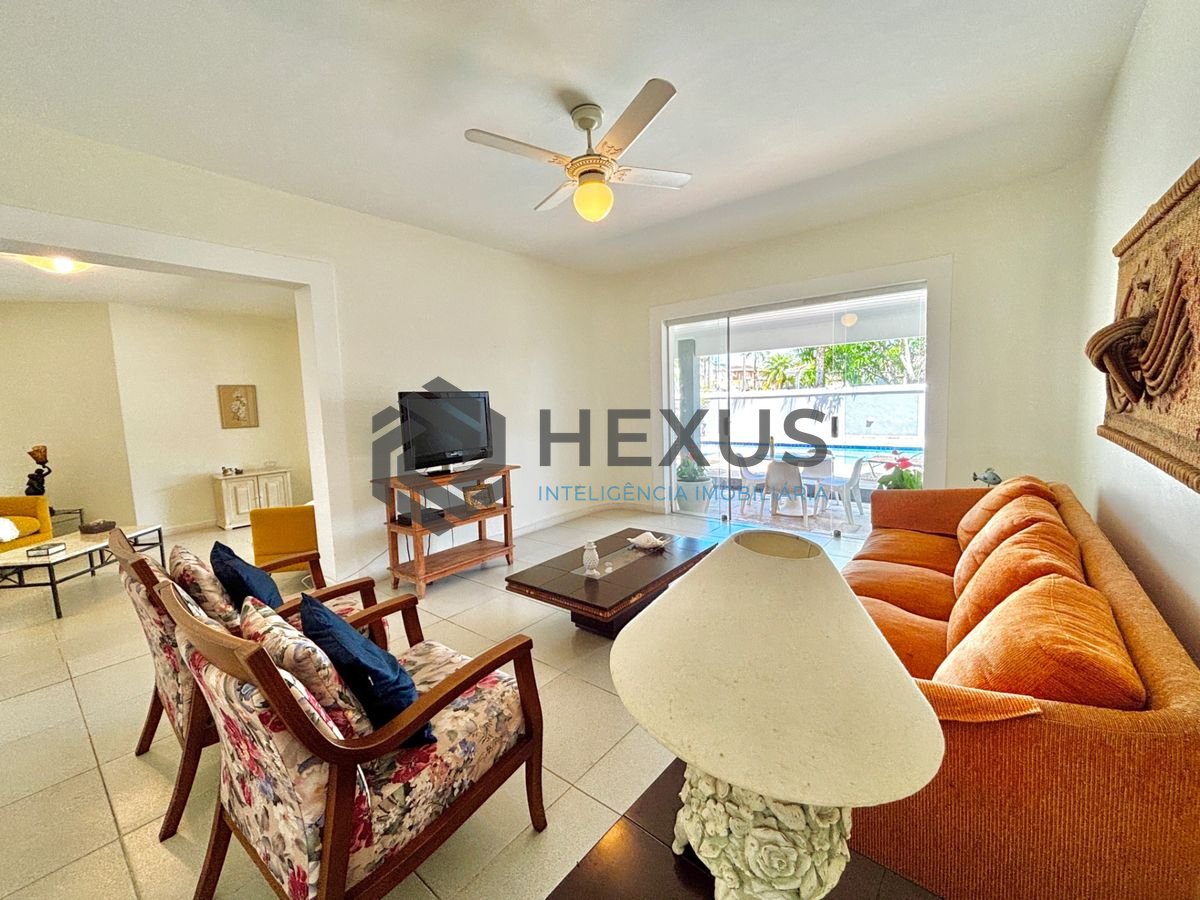 Foto 7 de Casa reformada com piscina e área gourmet no Jardim Acapulco, Guarujá